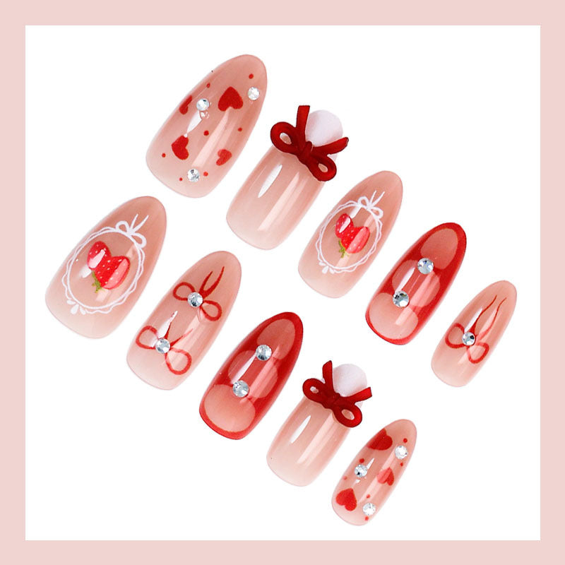 Artificial nail set with cute heart and bow designs Kalsten