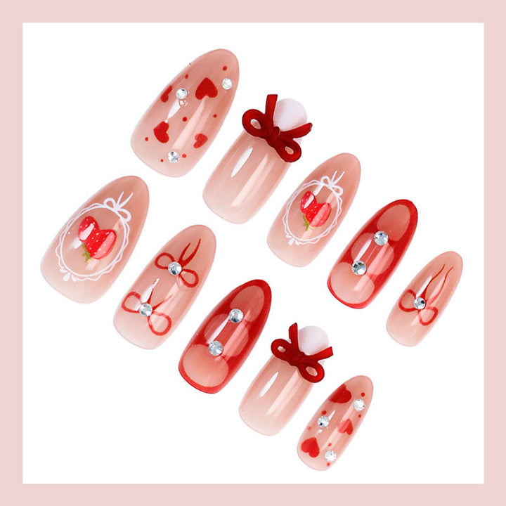 Artificial nail set with cute heart and bow designs Kalsten