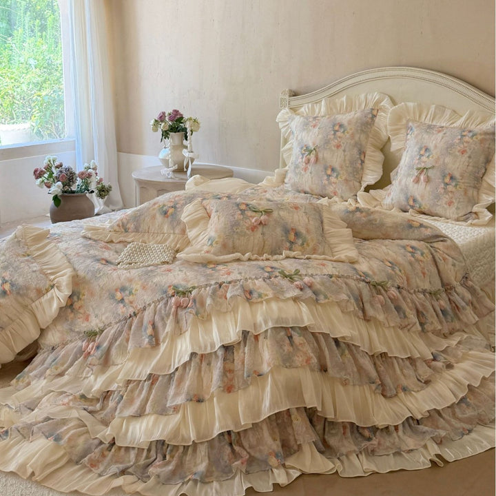 Romantic bedding set with layered ruffle, frills, and delicate watercolor flower print