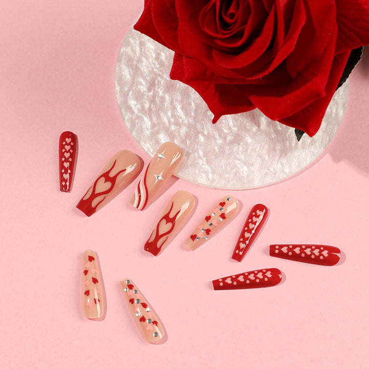 Artful Nail Art with Hearts and Glitter Accents Kalsten