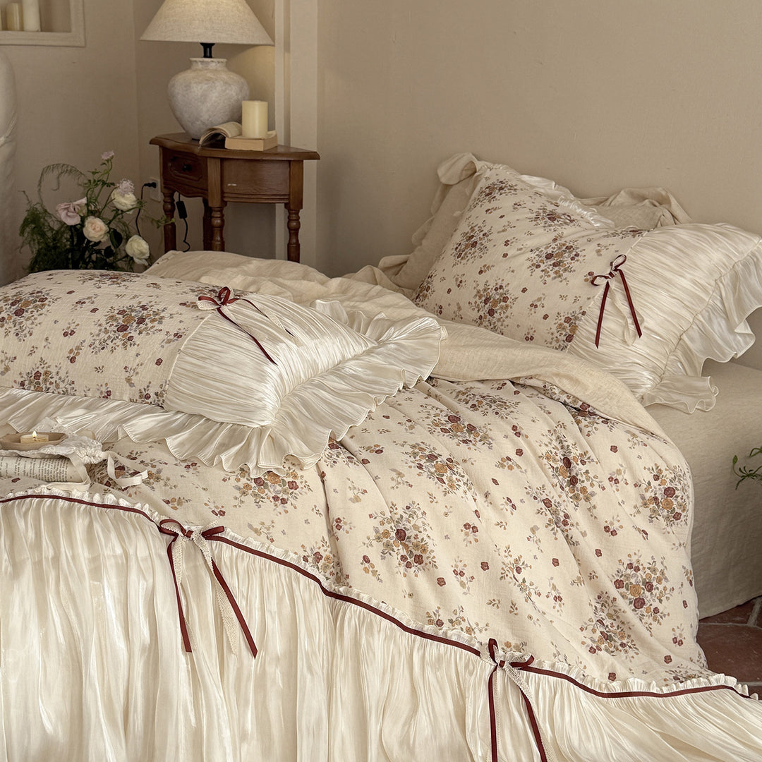 Bedding set with pleated satin bed skirt and vintage floral print