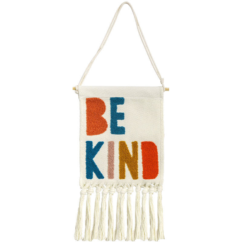 Hand-tufted wall hanging made of cotton with rainbow motif and fringes