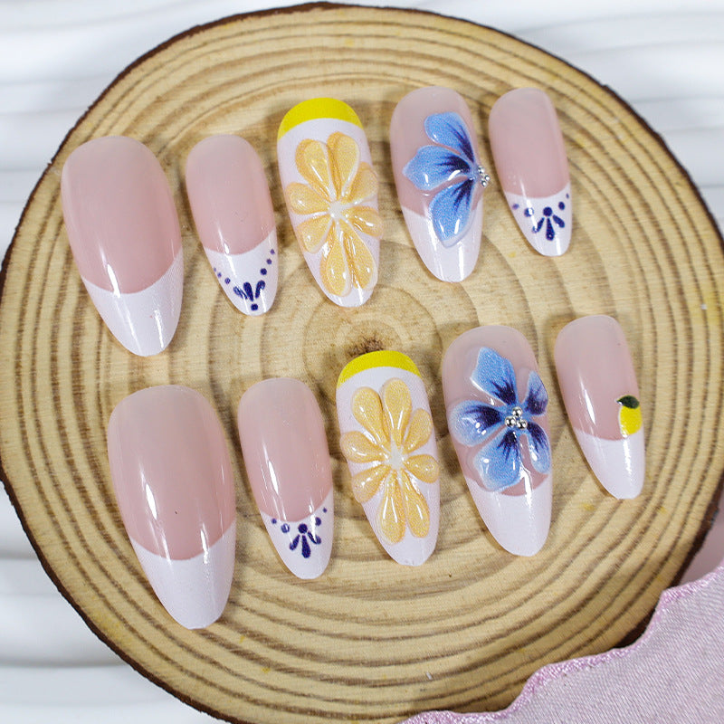 Nail art set with elegant floral and butterfly accents Kalsten
