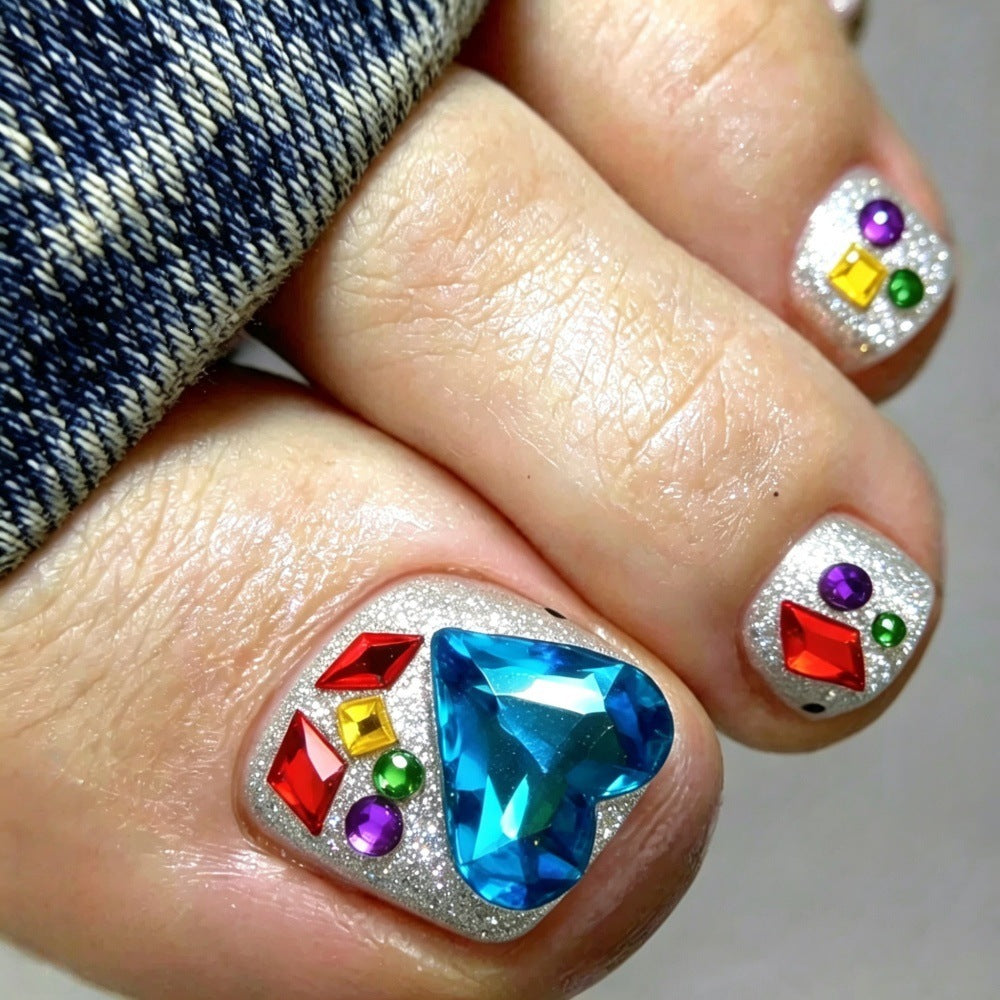 Artificial nails with sparkling rhinestone applications Kalsten