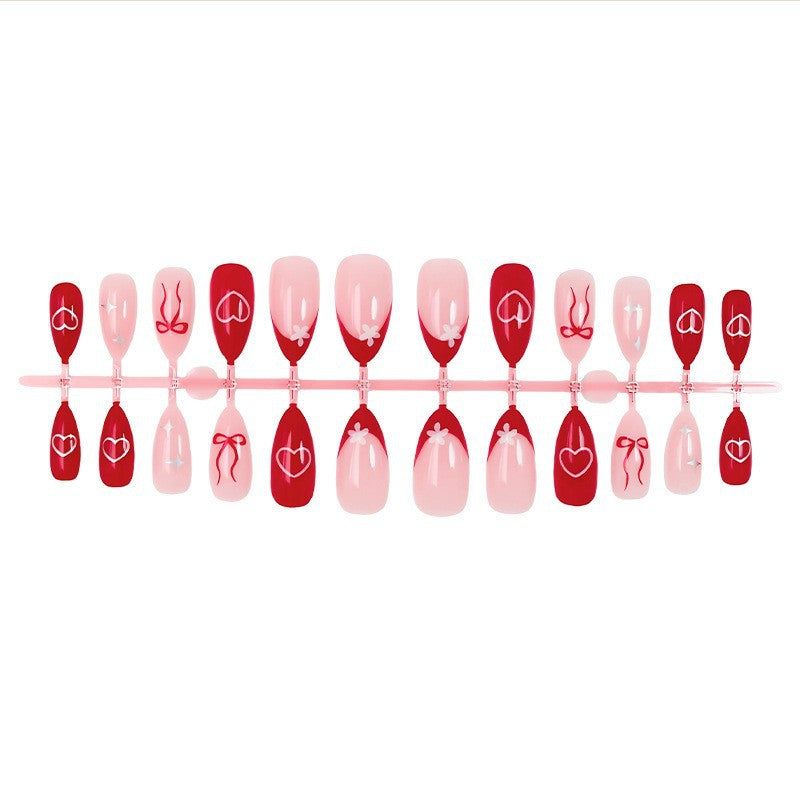 Artificial nail set with romantic hearts and bows Kalsten