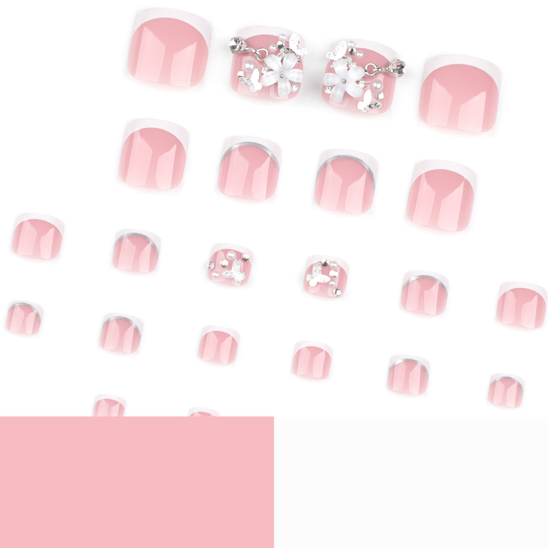 Artful toenail design with elegant flower and glitter accents Kalsten