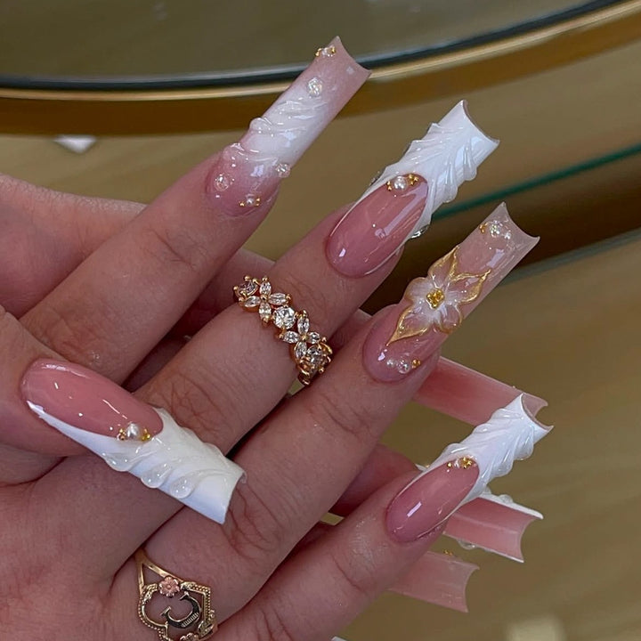 Acrylic nails with luxurious flower design and elegant accents Kalsten