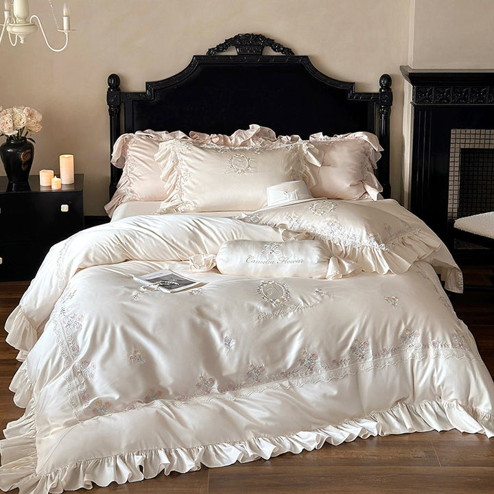 Luxurious satin bedding set with fine floral embroidery and ruffles