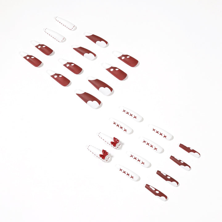 Artful stiletto nails with bow and zigzag design Kalsten