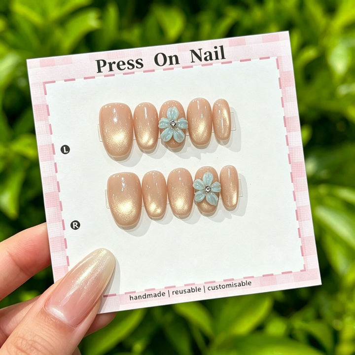 Artistic Press-On Nail Art Set with Cute Character and Bow Accents