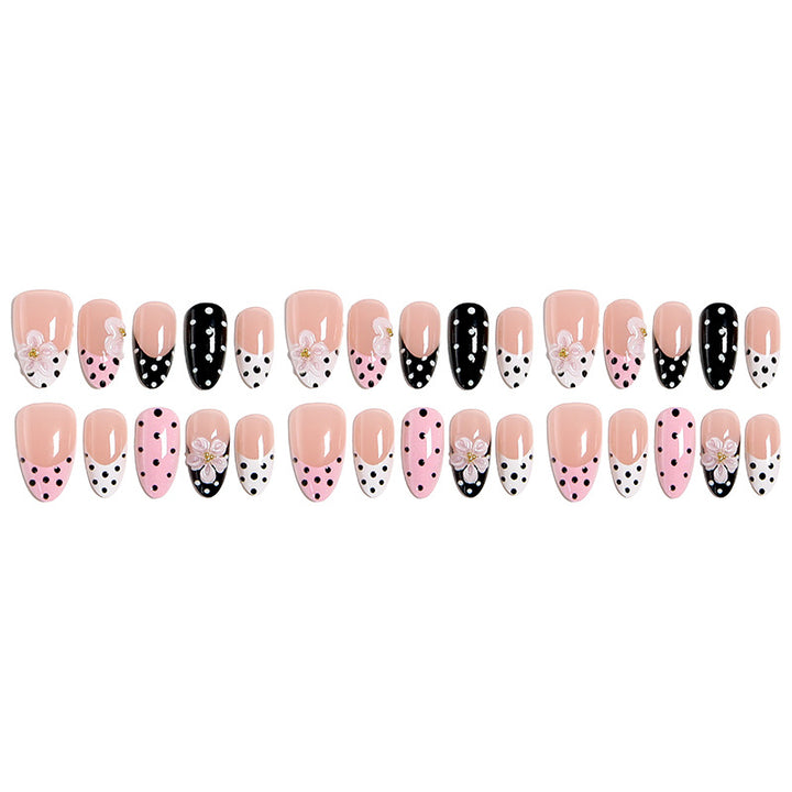 Nail art set with floral accents and elegant dots Kalsten