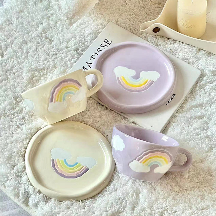 Stoneware breakfast mug with saucer and embossed rainbow design