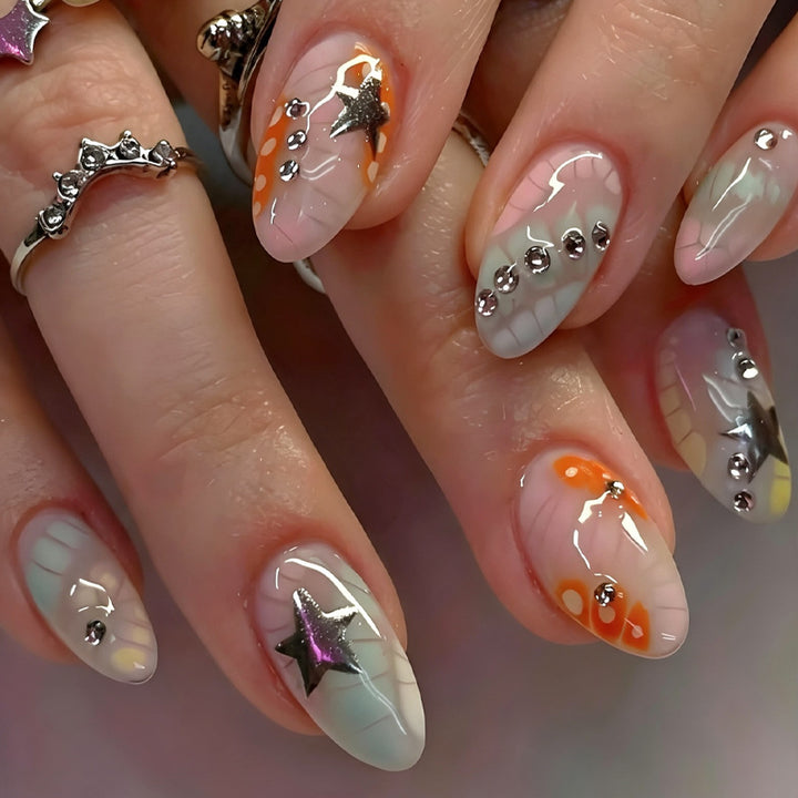 Acrylic nail set with creative designs and glitter accents Kalsten