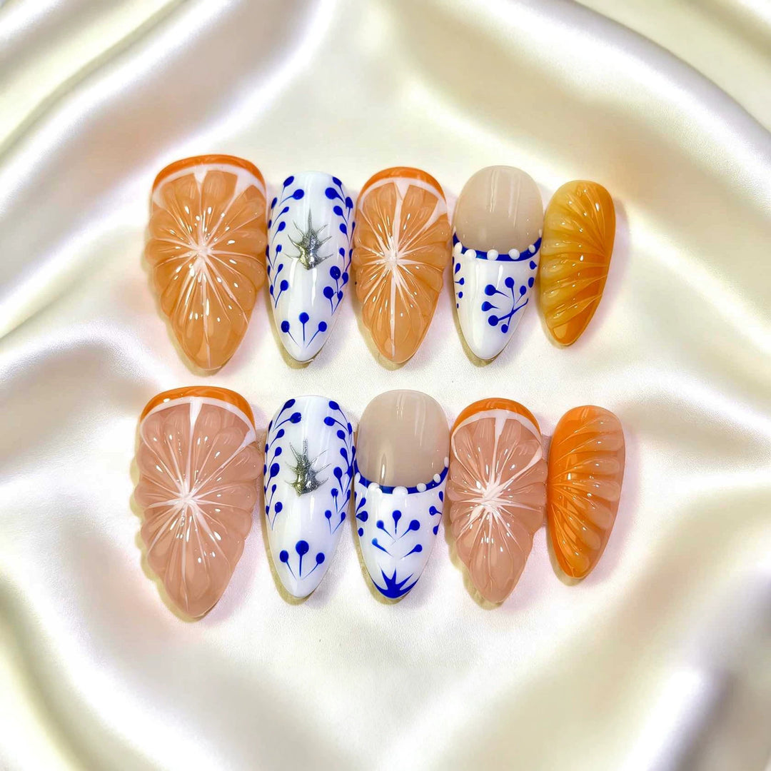 Artistic Press-On Nail Set Featuring Citrus Patterns