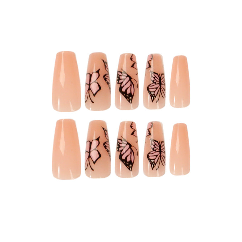 Artful acrylic nails with dynamic butterfly design Kalsten