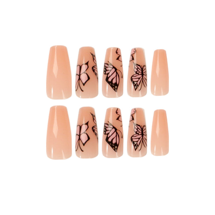 Artful acrylic nails with dynamic butterfly design Kalsten