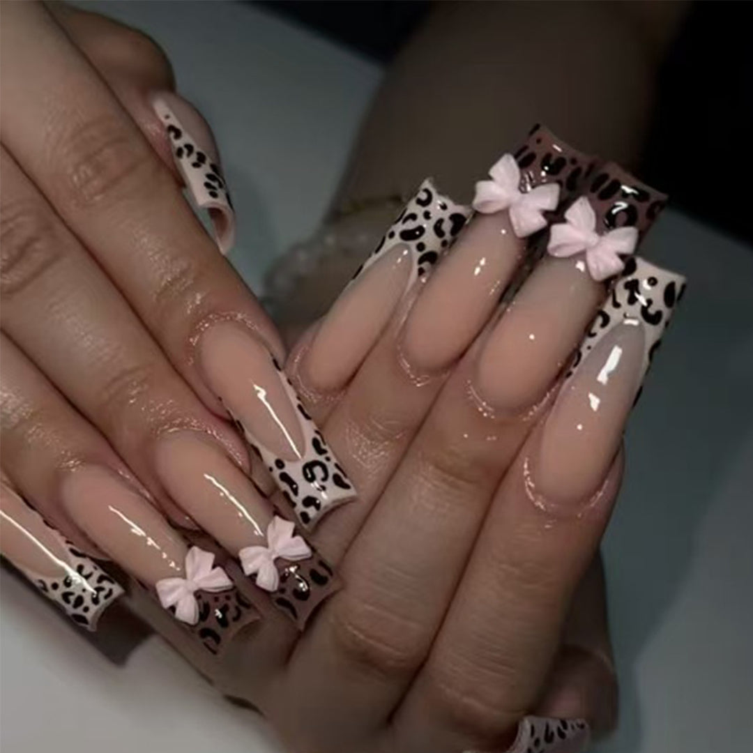 Decorative Stiletto Nail Extensions with Bow Accents Kalsten