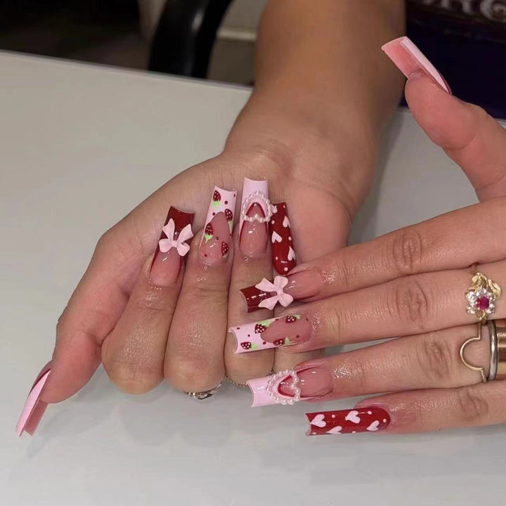 Decorative Long Press-On Nails with Hearts and Floral Accents Kalsten
