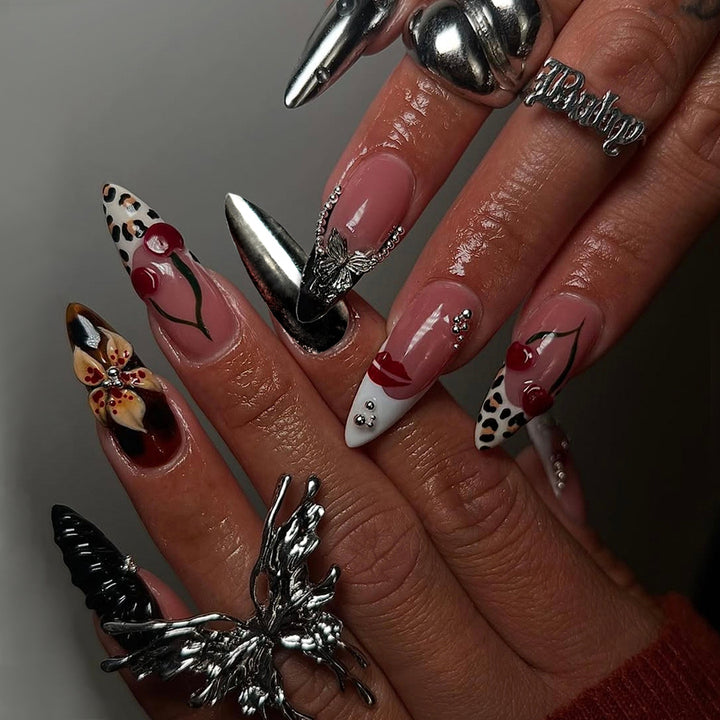 Artful Stiletto Fingernails with Unique Design Elements Kalsten