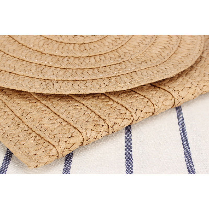Shoulder bag made of braided natural material with original wave pattern Kalsten
