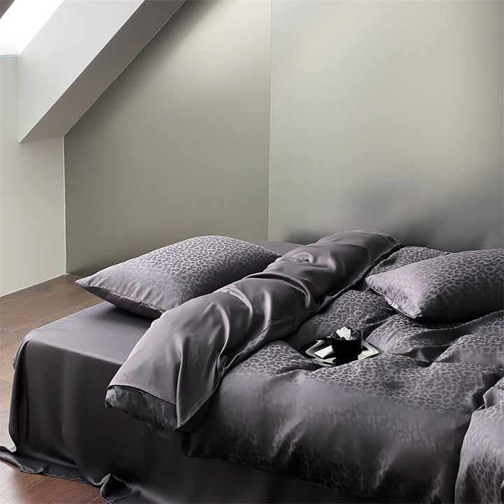 Luxurious satin bedding set with jacquard leopard pattern and silky-matte finish