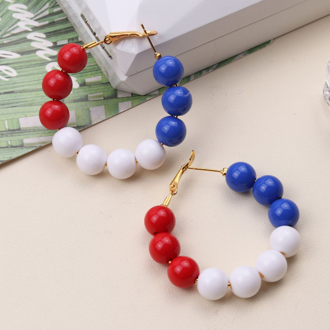 Women's nan statement hoops with large pearl beads and clip closure Kalsten
