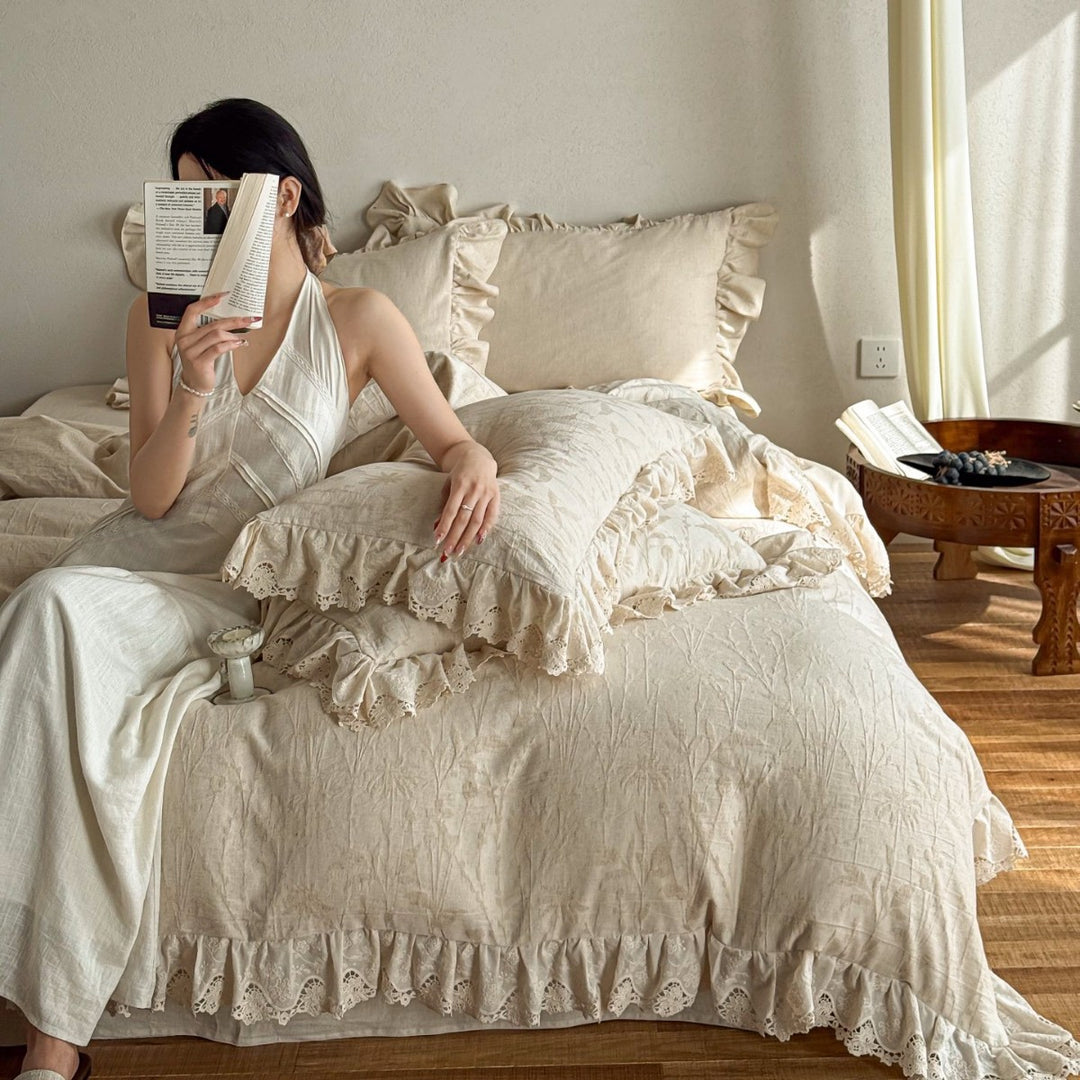 Cotton-linen bedding set with subtle jacquard floral pattern and ruffle trim