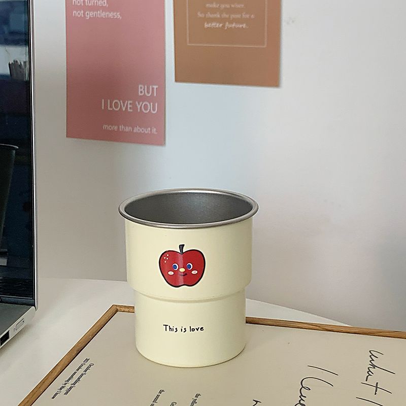 Multifunctional ceramic mug with cheerful apple design Kalsten