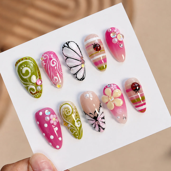 Artificial nail set with playful floral and glitter motifs Kalsten