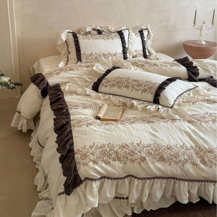 Vintage-inspired country house bedding set with ruffles and floral ribbon embroidery