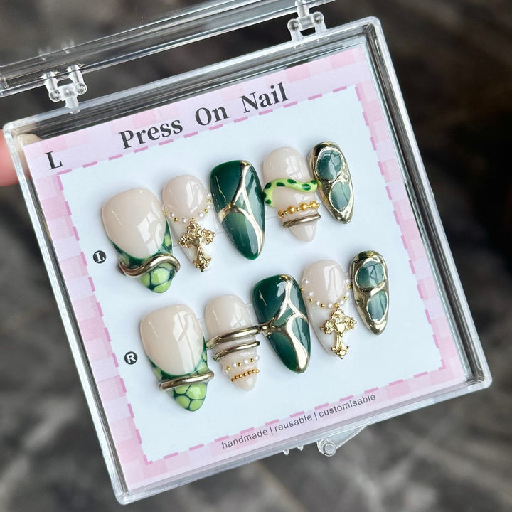 Artistic Press-On Nail Set with Floral and Green Accents