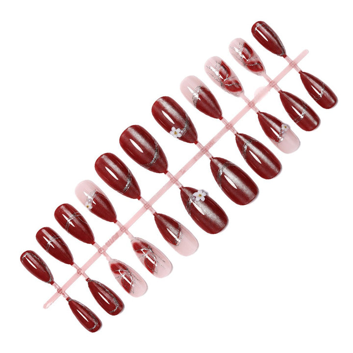 Nail set with elegant metallic finish and delicate flower decorations Kalsten