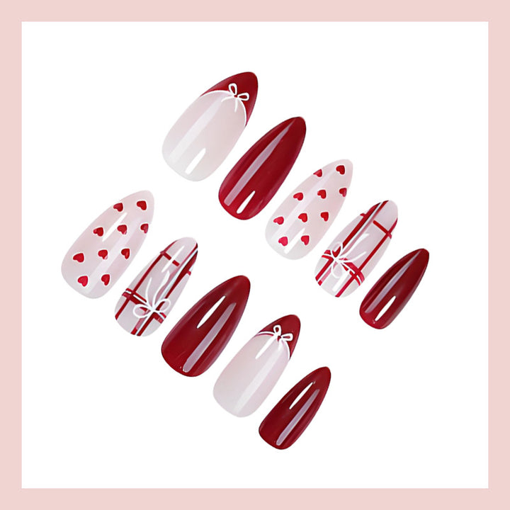 Nail set with playful hearts and elegant bows Kalsten