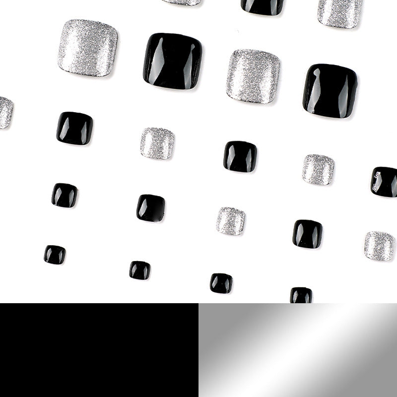 Artful toenail art with glitter and black design Kalsten