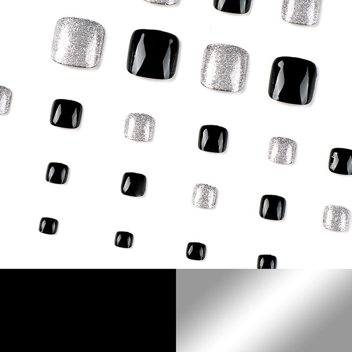 Artful toenail art with glitter and black design Kalsten