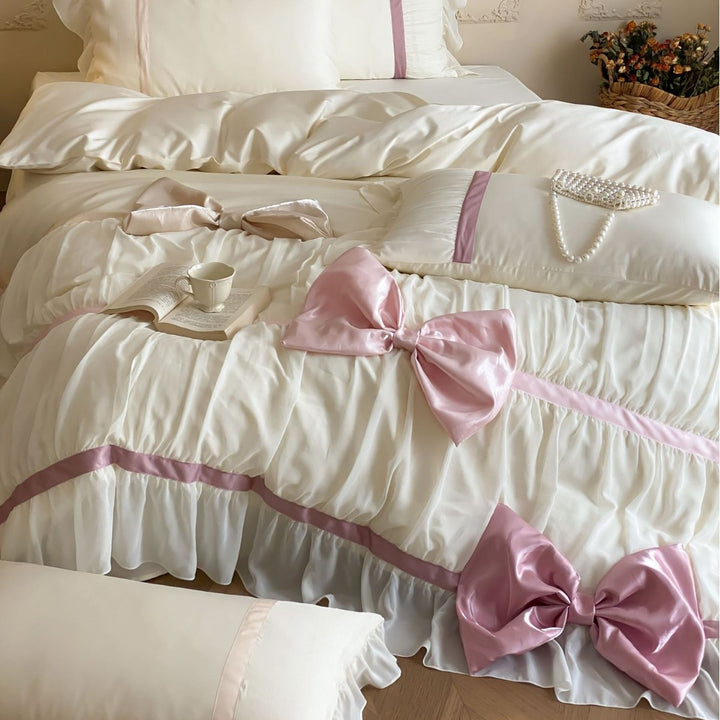 Bedding set with large satin bows, ruffled frill and decorative pillowcases