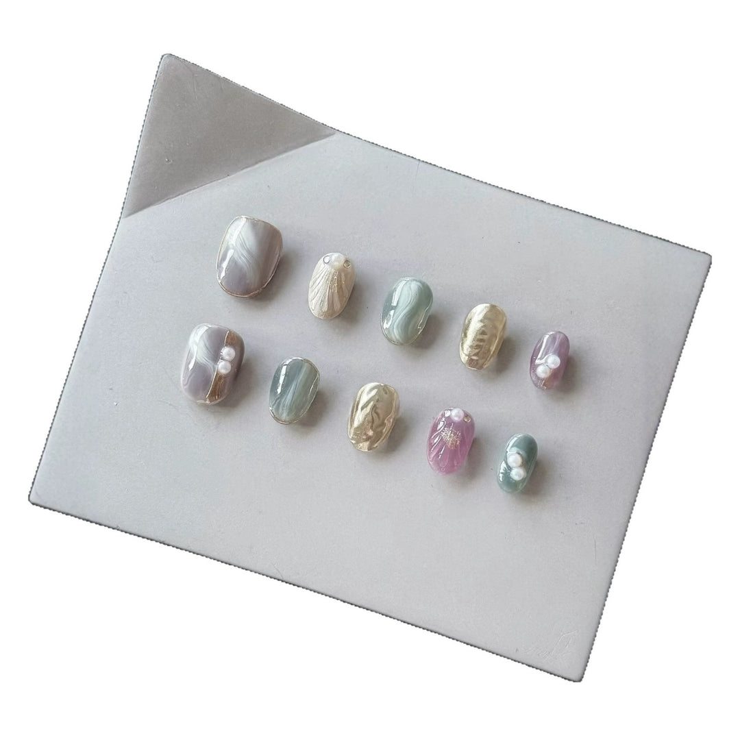 Artistic Press-On Nail Set with Pearl and Marble Accents