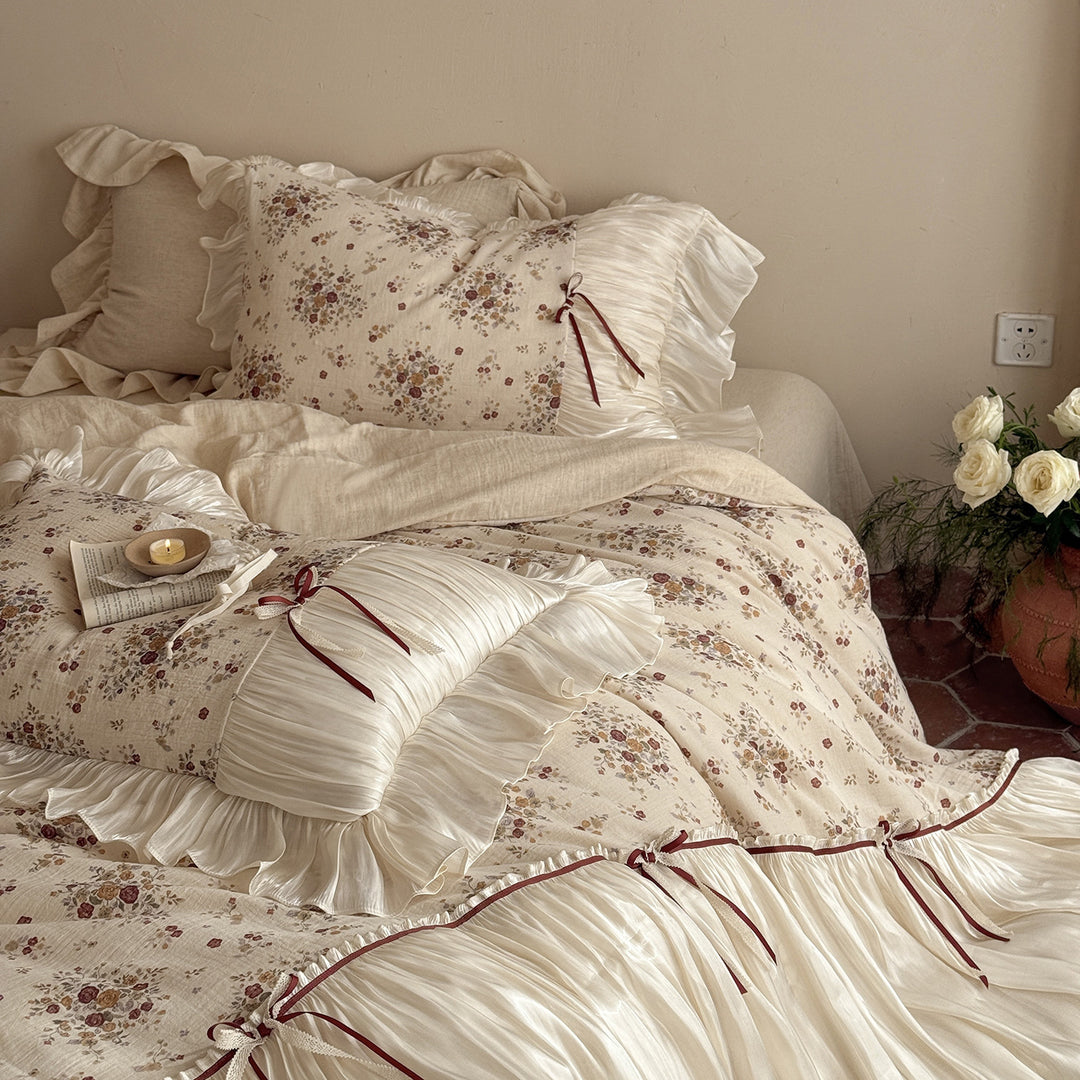 Bedding set with pleated satin bed skirt and vintage floral print