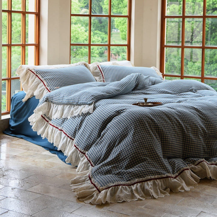 Luxurious bed linen set made of cotton gauze with quilted blanket and lace trim