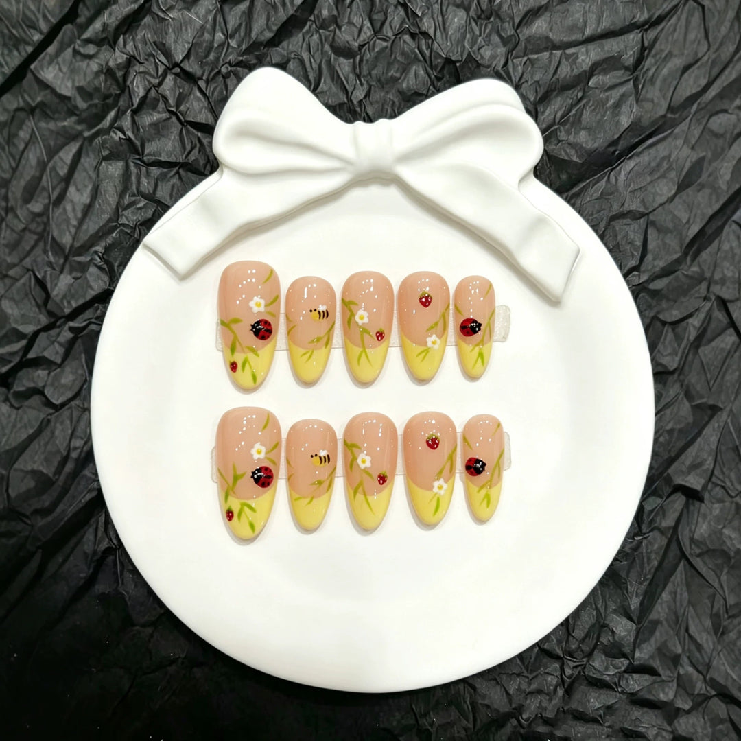 Artistic Press-On Nail Set with Floral and Insect Designs