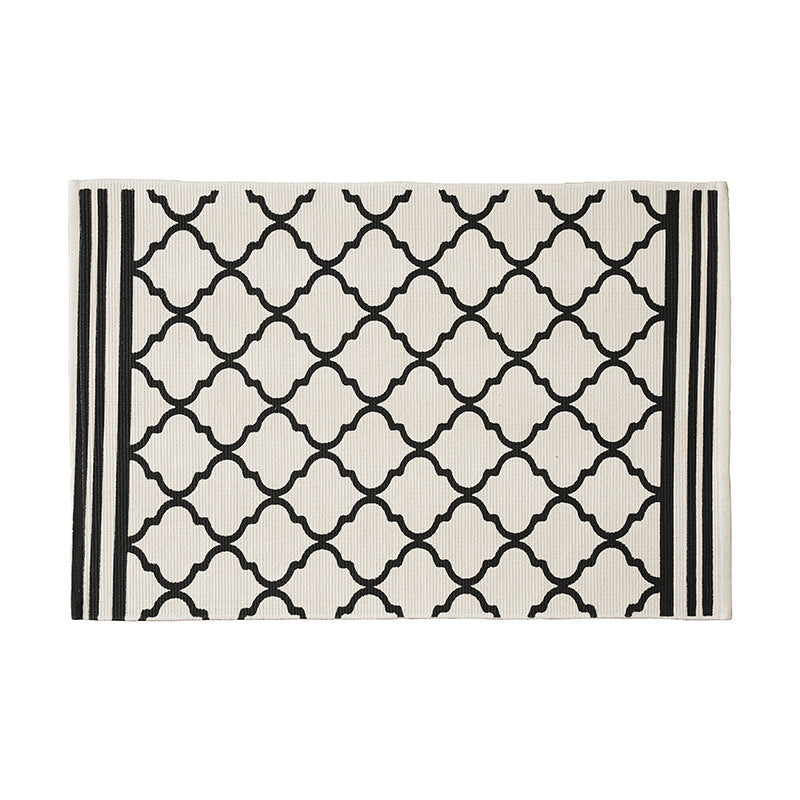Flat-woven runner rug with diamond pattern and easy-care texture