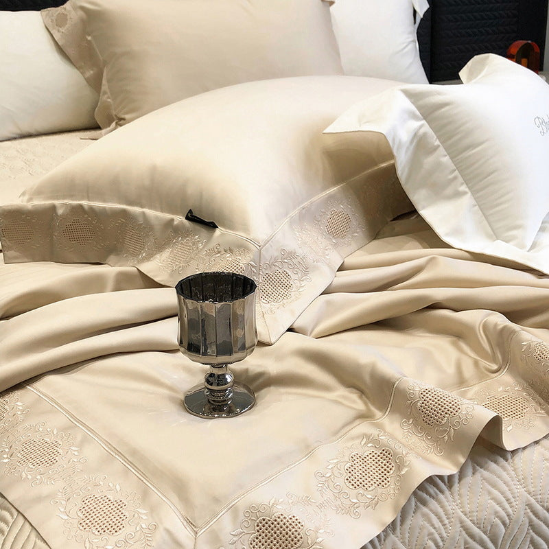 High-gloss satin bed linen set with floral cutwork embroidery border