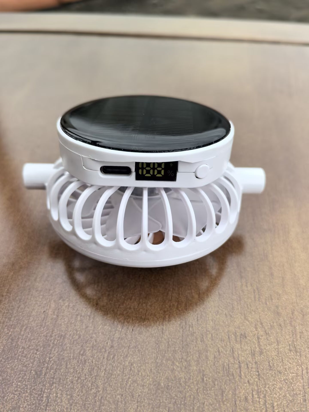 Solar-powered mini fan with digital battery level indicator and USB-C charging port Kalsten