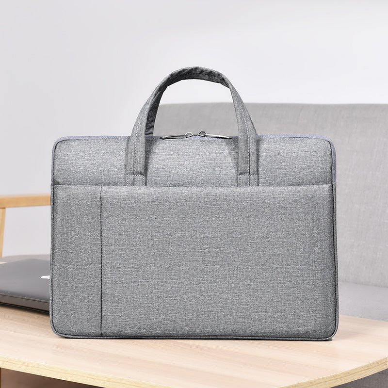 Laptop and briefcase in modern, minimalist design Kalsten