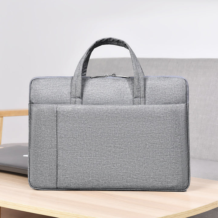 Laptop and briefcase in modern, minimalist design Kalsten