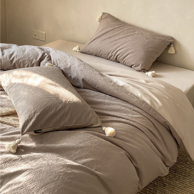 Finely textured cotton satin bedding set with tone-on-tone relief