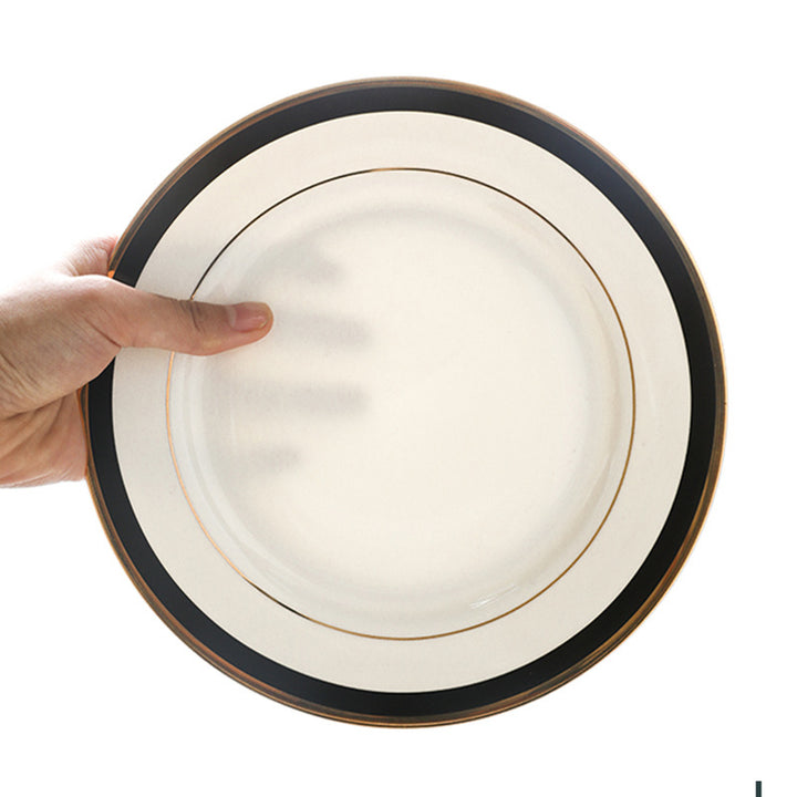 Porcelain plate with fine metal rim decoration and contrasting decorative ribbon