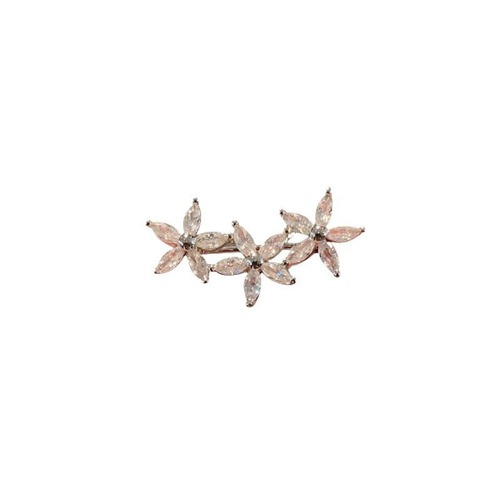 Flower brooch made of radiant gemstones Kalsten