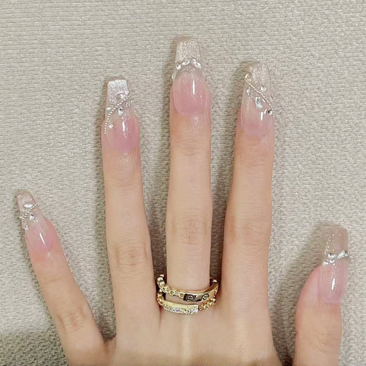 Decorative Press-On Nail Set with Glitter and Rhinestone Accents Kalsten