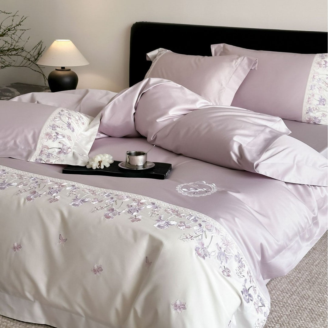 Luxurious satin bedding set with floral stitched border